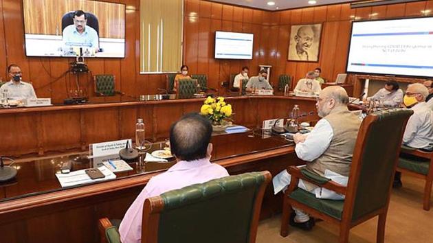 Home Minister Amit Shah chaired a high level meeting with Delhi CM Arvind Kejriwal to review COVID-19 situation in Delhi, at the Ministry of Home Affairs on June 21. The meeting was the latest in a series of evaluations and overhauls of Delhi’s Covid-19 strategy. (HT Photo) Home Minister Amit Shah chaired a high level meeting with Delhi CM Arvind Kejriwal to review COVID-19 situation in Delhi, at the Ministry of Home Affairs on June 21. The meeting was the latest in a series of evaluations and overhauls of Delhi’s Covid-19 strategy. (HT Photo)