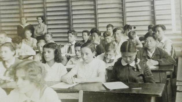 This photocopy of an undated picture provided by Primary School No. 5 in Otwock shows North Korean and Polish primary school children with their Polish teachers inside their school in Otwock, Poland, where North Korean war orphans lived and went to school in the 1950s. During and after the 1950-53 Korean War, North Korea sent thousands of orphans it couldn’t feed to Eastern European communist allies. The children entered schools in Poland, Bulgaria, Romania and elsewhere, forming friendships, studying, playing. (AP)