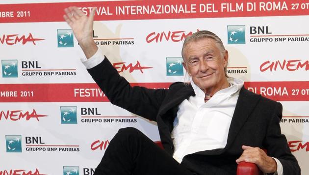 Director Joel Schumacher waves during a photo call for Cinema and Advertising. (AP Photo/Pier Paolo Cito, File)
