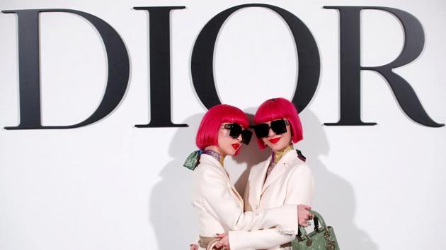 FILE PHOTO: Ami and Aya Suzuki aka Amiaya pose during a photocall before Dior Fall/Winter 2020/21 women's ready-to-wear collection show during Paris Fashion Week in Paris, France. (REUTERS/Gonzalo Fuentes) FILE PHOTO: Ami and Aya Suzuki aka Amiaya pose during a photocall before Dior Fall/Winter 2020/21 women's ready-to-wear collection show during Paris Fashion Week in Paris, France. (REUTERS/Gonzalo Fuentes)