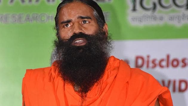 Yoga guru Ramdev addresses the media in Haridwar during the launch of 'Coronil' and 'Swasari', ayurvedic medicines that his company Patanjali claims cure coronavirus disease. (PTI) Yoga guru Ramdev addresses the media in Haridwar during the launch of 'Coronil' and 'Swasari', ayurvedic medicines that his company Patanjali claims cure coronavirus disease. (PTI)