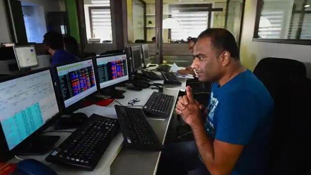 According to traders, despite opening on a positive note, selloff in financial stocks dragged domestic equities into the negative territory. (HT photo) According to traders, despite opening on a positive note, selloff in financial stocks dragged domestic equities into the negative territory. (HT photo)
