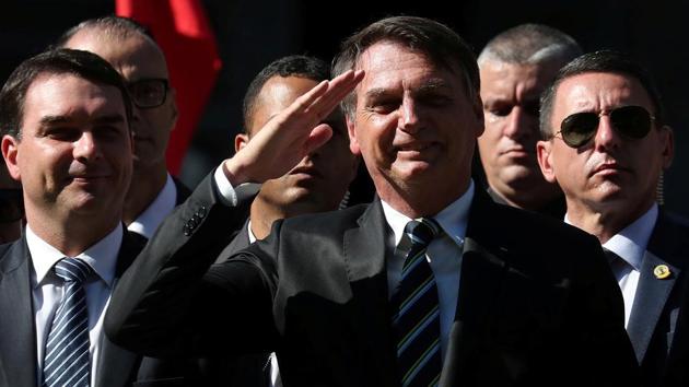 Brazilian President Jair Bolsonaro often appears at public events with a mask, unlike some other heads of state. (Reuters file photo) Brazilian President Jair Bolsonaro often appears at public events with a mask, unlike some other heads of state. (Reuters file photo)