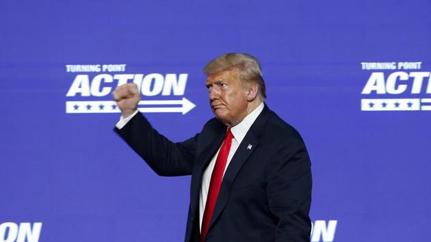 US President Donald Trump gives a fist pump to the crowd after addressing a gathering in Phoenix on Tuesday. (AP Photo) US President Donald Trump gives a fist pump to the crowd after addressing a gathering in Phoenix on Tuesday. (AP Photo)