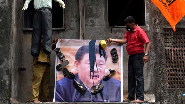 Maharashtra Navnirman Sena (MNS) workers hang garland made of footwear on the poster of Chinese President Xi Jinping as they protest against China over the Galwan valley stand-off in which 20 Indian soldiers laid their lives. (Satish Bate/HT File Photo) Maharashtra Navnirman Sena (MNS) workers hang garland made of footwear on the poster of Chinese President Xi Jinping as they protest against China over the Galwan valley stand-off in which 20 Indian soldiers laid their lives. (Satish Bate/HT File Photo)