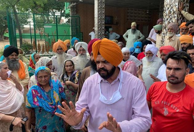 Dakha MLA Manpreet Singh Ayali pacifyingresidents of Jangpur village on Wednesday. (HT Photo) Dakha MLA Manpreet Singh Ayali pacifyingresidents of Jangpur village on Wednesday. (HT Photo)