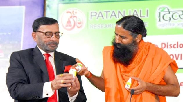 Baba Ramdev launching a medicine kit for Covid-19, in Haridwar on Tuesday.(ANI Photo)