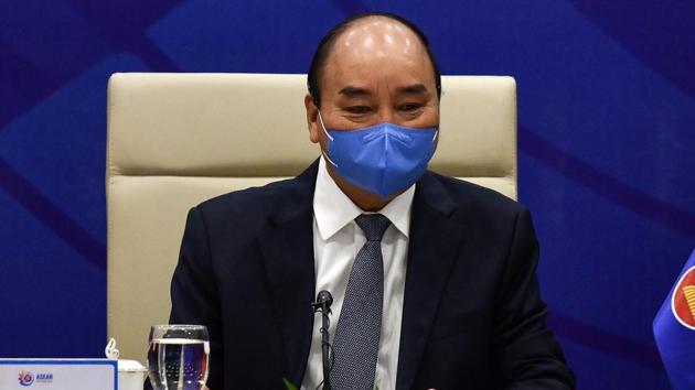Vietnam's Prime Minister Nguyen Xuan Phuc waits for the start of a special video conference with leaders of the Association of Southeast Asian Nations (ASEAN) on the coronavirus disease (COVID-19), in Hanoi.(REUTERS)