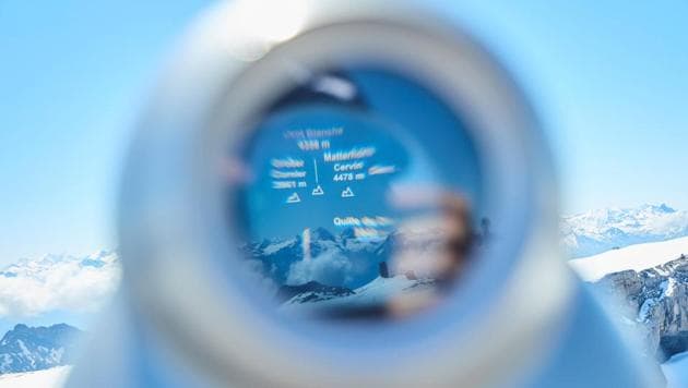 The Matterhorn is pictured through a binocular at the Glacier 3000 resort in Les Diablerets, Switzerland June 23, 2020. (REUTERS/Denis Balibouse)