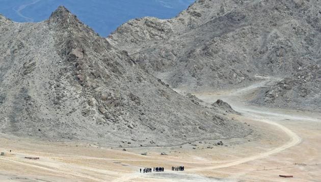 Indian soldiers walk at the foothills of a mountain range near Leh, the joint capital of the union territory of Ladakh, on June 24, 2020.(AFP file photo) Indian soldiers walk at the foothills of a mountain range near Leh, the joint capital of the union territory of Ladakh, on June 24, 2020.(AFP file photo)