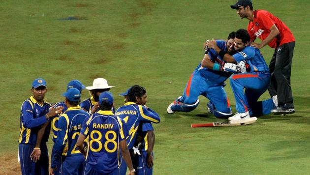 India players Yuvraj Singh, Virat Kohli and Dr Nitin Patel (R) celebrate watched by the Sri Lankan team after India defeated Sri Lanka a in the 2011 ICC World Cup Final. (Getty Images) India players Yuvraj Singh, Virat Kohli and Dr Nitin Patel (R) celebrate watched by the Sri Lankan team after India defeated Sri Lanka a in the 2011 ICC World Cup Final. (Getty Images)