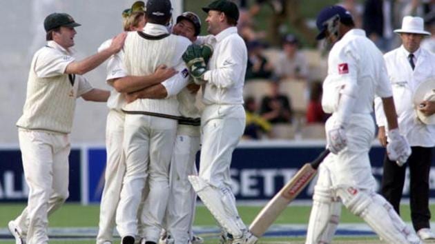 Shane Warne of Australia celebrates the wicket of Rahul Dravid (right) of India with team mates in Adelaide.(Getty Images)