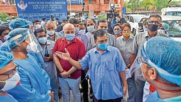 CM Kejriwal and deputy CM Sisodia during an interaction with health care staff of Lok Nayak hospital on Thursday. (Biplov Bhuyan/HT photo) CM Kejriwal and deputy CM Sisodia during an interaction with health care staff of Lok Nayak hospital on Thursday. (Biplov Bhuyan/HT photo)
