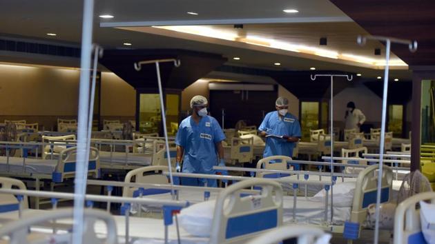 A view inside the 100-bed Shehnai Banquet Covid care facility attached to LNJP hospital on June 25. The hospital’s lone isolation ward — with its own separate elevator — had been created during the H1N1 outbreak of 2009-10. Recent months have been marked by quick manoeuvring to adapt to rapid surges in the number of cases. Hospital administrators told HT that no one had initially expected the virus to spread at this scale. (Sonu Mehta / HT Photo) A view inside the 100-bed Shehnai Banquet Covid care facility attached to LNJP hospital on June 25. The hospital’s lone isolation ward — with its own separate elevator — had been created during the H1N1 outbreak of 2009-10. Recent months have been marked by quick manoeuvring to adapt to rapid surges in the number of cases. Hospital administrators told HT that no one had initially expected the virus to spread at this scale. (Sonu Mehta / HT Photo)