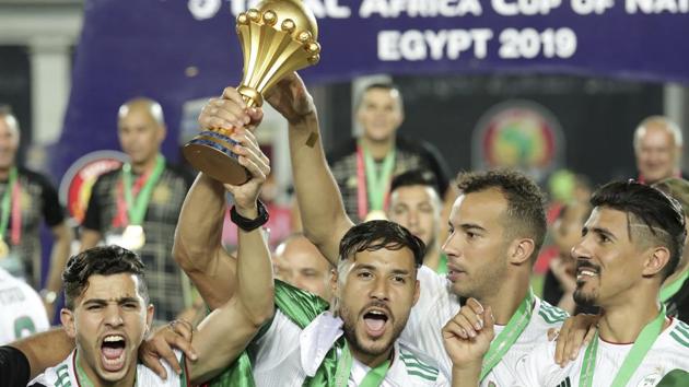 Algeria's players celebrates with the trophy at the end of the African Cup of Nations.(AP)