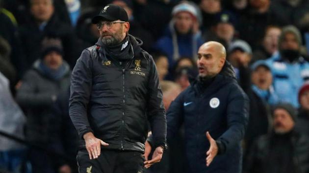 Liverpool manager Juergen Klopp looks on as Manchester City manager Pep Guardiola reacts. (Action Images via Reuters) Liverpool manager Juergen Klopp looks on as Manchester City manager Pep Guardiola reacts. (Action Images via Reuters)
