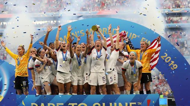 LYON, FRANCE - JULY 07: Megan Rapinoe of the USA lifts the FIFA Women's World Cup Trophy following her team's victory in the 2019 FIFA Women's World Cup France Final match between The United States of America and The Netherlands at Stade de Lyon on July 07, 2019 in Lyon, France. ((Getty Images) LYON, FRANCE - JULY 07: Megan Rapinoe of the USA lifts the FIFA Women's World Cup Trophy following her team's victory in the 2019 FIFA Women's World Cup France Final match between The United States of America and The Netherlands at Stade de Lyon on July 07, 2019 in Lyon, France. ((Getty Images)