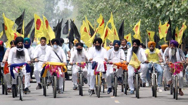 Ludhiana MLAs Simranjeet Singh Bains and Balwinder Singh Bains, along with party workers, during a cycle rally in Mohali on Friday. A gathering of nearly 250 had collected for the rally. (GURMINDER SINGH/HT) Ludhiana MLAs Simranjeet Singh Bains and Balwinder Singh Bains, along with party workers, during a cycle rally in Mohali on Friday. A gathering of nearly 250 had collected for the rally. (GURMINDER SINGH/HT)