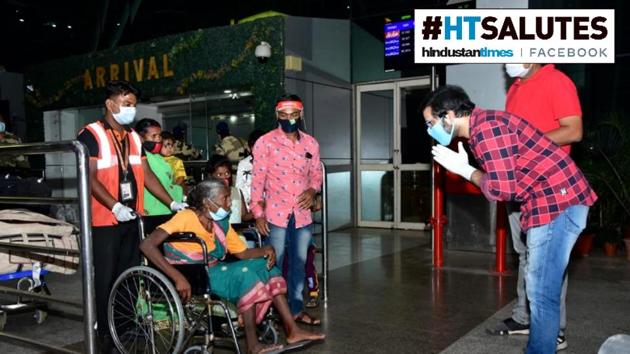 Sabyasachi Mishra welcomes the partially paralysed mother of an Odia migrant worker whom he flew out from Bangalore, in Bhubaneswar, Odisha. (Sabyasachi Mishra) Sabyasachi Mishra welcomes the partially paralysed mother of an Odia migrant worker whom he flew out from Bangalore, in Bhubaneswar, Odisha. (Sabyasachi Mishra)