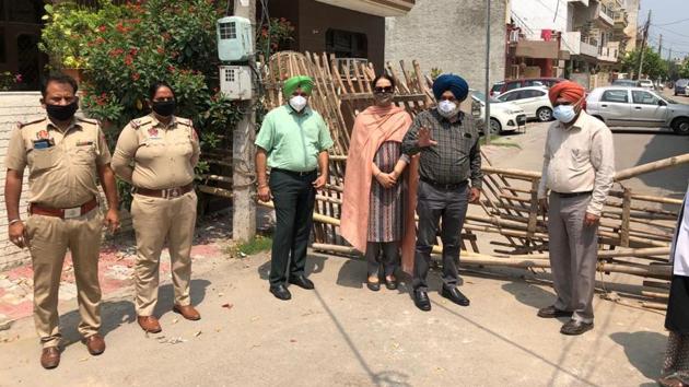 Mohali civil surgeon Dr Manjit Singh along with a team of senior health officials visiting affected areas in Dera Bassi, and three other micro containment zones—Harmilap Nagar, Baltana and Sector 91—in Mohali on Saturday. (HT PHOTO) Mohali civil surgeon Dr Manjit Singh along with a team of senior health officials visiting affected areas in Dera Bassi, and three other micro containment zones—Harmilap Nagar, Baltana and Sector 91—in Mohali on Saturday. (HT PHOTO)