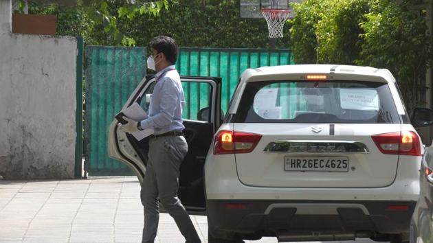 Enforcement Directorate (ED) officials arrive at Congress Rajya Sabha MP Ahmed Patel’s residence in connection with a money laundering case involving Sterling Biotech Ltd., in New Delhi. (Sonu Mehta/HT PHOTO) Enforcement Directorate (ED) officials arrive at Congress Rajya Sabha MP Ahmed Patel’s residence in connection with a money laundering case involving Sterling Biotech Ltd., in New Delhi. (Sonu Mehta/HT PHOTO)