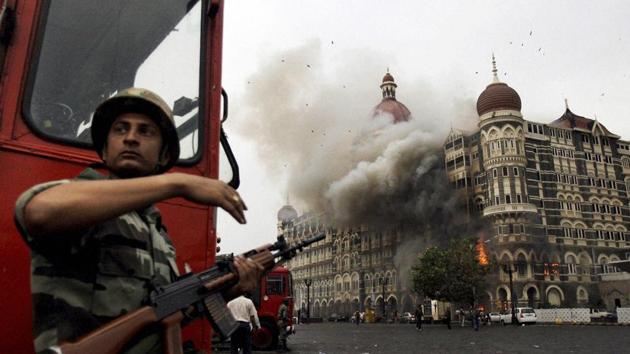 Smoke is seen billowing out of the ground and first floor of the Taj Hotel in south Mumbai during security personnel's "Operation Cyclone" following the 26/11 terror attacks in 2008. Lashkar-e-Taiba (LeT) operative David Coleman Headley deposed on Monday at a Mumbai court through a video link. (PTI) Smoke is seen billowing out of the ground and first floor of the Taj Hotel in south Mumbai during security personnel's "Operation Cyclone" following the 26/11 terror attacks in 2008. Lashkar-e-Taiba (LeT) operative David Coleman Headley deposed on Monday at a Mumbai court through a video link. (PTI)