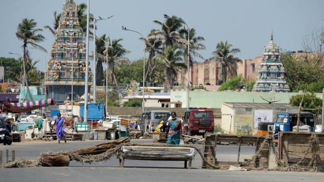 A road is seen blocked in a containment area after a rise of COVID-19 infection cases in Chennai on June 24. Delhi, Mumbai and Chennai are the three worst-hit cities in the country, accounting for nearly 40% of all cases. (Arun SANKAR / AFP)