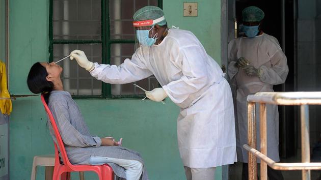 Eight states, which include Maharashtra, Delhi and Tamil Nadu have contributed 85.5 per cent of the active Covid-19 caseload and 87 per cent of the total deaths due to the disease in India has occurred in these states. (AFP PHOTO.) Eight states, which include Maharashtra, Delhi and Tamil Nadu have contributed 85.5 per cent of the active Covid-19 caseload and 87 per cent of the total deaths due to the disease in India has occurred in these states. (AFP PHOTO.)