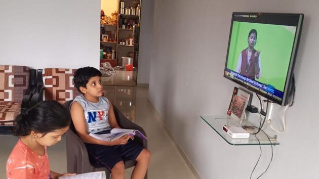 Teachers record videos in a makeshift studio of Nagesh Karajagi Orchid School, which has tied up with the local cable network. Teachers record videos in a makeshift studio of Nagesh Karajagi Orchid School, which has tied up with the local cable network.