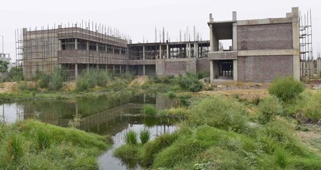 The construction of the building on the five-acre land started on November 3, 2018, and so far, only one block is ready. Two blocks are still under construction and require at least four months for completion. (Gurpreet Singh/HT) The construction of the building on the five-acre land started on November 3, 2018, and so far, only one block is ready. Two blocks are still under construction and require at least four months for completion. (Gurpreet Singh/HT)