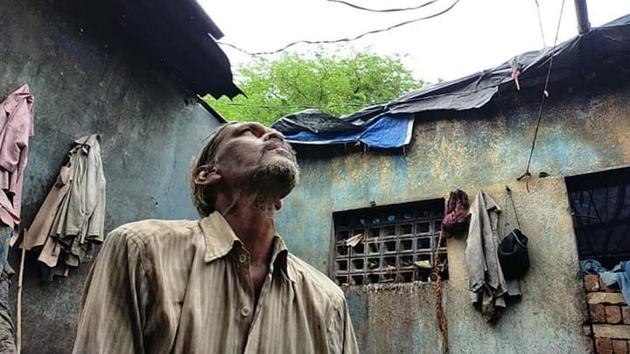 Ananta (Anna) Katkari in his house which was severely damaged by Cyclone Nisarga, in Hmgaon village, Karjat. Ananta (Anna) Katkari in his house which was severely damaged by Cyclone Nisarga, in Hmgaon village, Karjat.