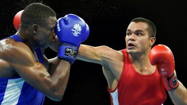 India's Vikas Krishan Yadav and Zambia's Benny Muziyo compete in the Men's 75kg category quarterfinals boxing bout at the Commonwealth Games 2018.(PTI)