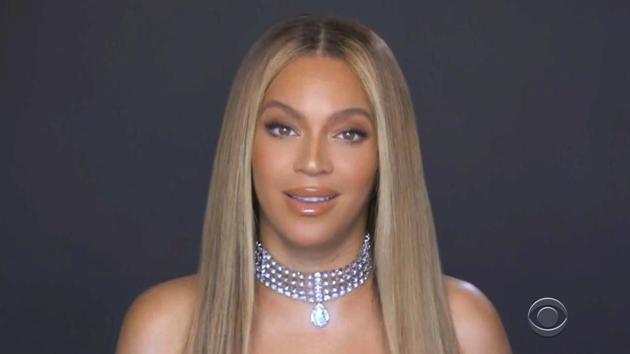 Beyonce accepts the humanitarian award during the BET Awards.(AP) Beyonce accepts the humanitarian award during the BET Awards.(AP)