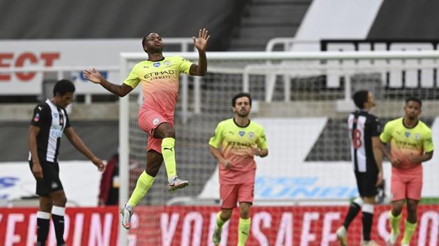 Manchester City's Raheem Sterling celebrates after scoring his side's second goal during the FA Cup sixth round soccer match between Newcastle United and Manchester City at St. James' Park in Newcastle, England, Sunday, June 28, 2020. (Shaun Botterill/Pool via AP)(AP)