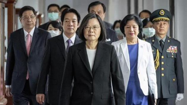 In this photo released by the Taiwan Presidential Office, President Tsai Ing-wen, walks ahead of Vice-President Lai Ching-te, as they attend an inauguration ceremony, Taipei, Taiwan, May 20, 2020(AP)