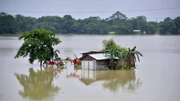 A partially submerged house is seen at the flood-affected Mayong village in Morigaon district, in the northeastern state of Assam, India. (REUTERS) A partially submerged house is seen at the flood-affected Mayong village in Morigaon district, in the northeastern state of Assam, India. (REUTERS)