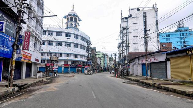 A road wears a deserted look after authorities declared a complete lockdown to curb the spread of coronavirus in Guwahati on June 29. The 14-day lockdown extends to the entire Kamrup Metropolitan district, under which the state capital Guwahati also falls. (PTI)