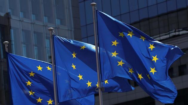 European Union flags flutter outside the European Commission headquarters in Brussels.(REUTERS) European Union flags flutter outside the European Commission headquarters in Brussels.(REUTERS)
