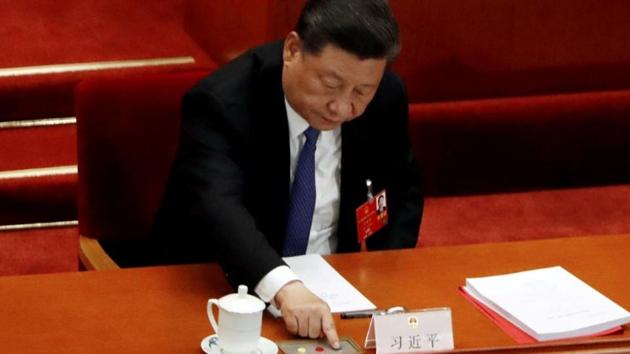 In this file picture, Chinese President Xi Jinping casts his vote on the national security legislation for Hong Kong Special Administrative Region at the closing session of the National People's Congress (NPC) at the Great Hall of the People in Beijing, China. (Reuters) In this file picture, Chinese President Xi Jinping casts his vote on the national security legislation for Hong Kong Special Administrative Region at the closing session of the National People's Congress (NPC) at the Great Hall of the People in Beijing, China. (Reuters)