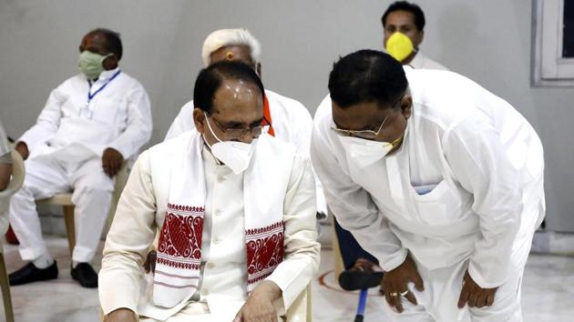 File photo of Madhya Pradesh Chief Minister Shivraj Singh Chouhan ( sitting) during Rajya Sabha election on June 19, 2020. Congress has raised the issue of a visit by the CM and other state and central BJP leaders to China in the past and Chouhan accepting hospitality of the Chinese Communist Party.(ANI File) File photo of Madhya Pradesh Chief Minister Shivraj Singh Chouhan ( sitting) during Rajya Sabha election on June 19, 2020. Congress has raised the issue of a visit by the CM and other state and central BJP leaders to China in the past and Chouhan accepting hospitality of the Chinese Communist Party.(ANI File)