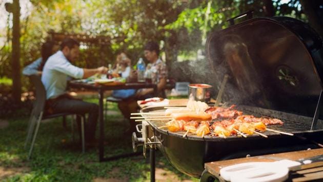 Set up a barbecue grill in your garden or the rooftop to replicate the feel of an outdoor picnic.(Photo: Shutterstock) Set up a barbecue grill in your garden or the rooftop to replicate the feel of an outdoor picnic.(Photo: Shutterstock)