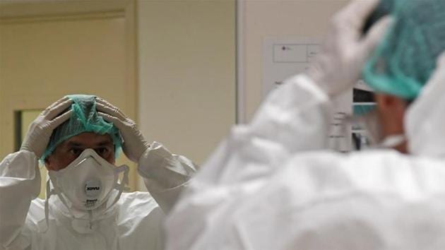 Besides battling with fear of coronavirus, doctors are also struggling to spare quality time for their families. (Reuters) Besides battling with fear of coronavirus, doctors are also struggling to spare quality time for their families. (Reuters)