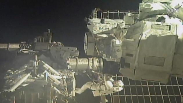 In this image taken from NASA video, commander Chris Cassidy, right, and NASA astronaut Bob Behnken perform their second spacewalk in under a week Wednesday, July 1, 2020, to replace old batteries outside the International Space Station. (AP) In this image taken from NASA video, commander Chris Cassidy, right, and NASA astronaut Bob Behnken perform their second spacewalk in under a week Wednesday, July 1, 2020, to replace old batteries outside the International Space Station. (AP)