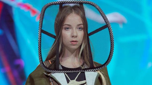 A model presents a creation 2033 (teens) by Belarusian designer Anastasiya Kutepova during a show at the festival and contest Fashion Mill, amid the coronavirus disease (COVID-19) outbreak, in Minsk, Belarus June 30, 2020. (REUTERS/Vasily Fedosenko) A model presents a creation 2033 (teens) by Belarusian designer Anastasiya Kutepova during a show at the festival and contest Fashion Mill, amid the coronavirus disease (COVID-19) outbreak, in Minsk, Belarus June 30, 2020. (REUTERS/Vasily Fedosenko)