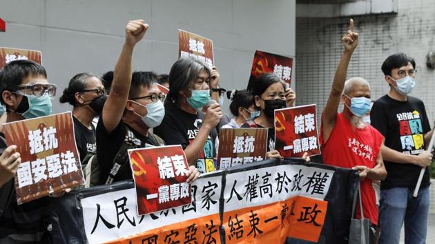 Officials insisted there had been wide consultation with members of Hong Kong society and hit back at criticism it was undermining Hong Kong’s autonomy. (AP) Officials insisted there had been wide consultation with members of Hong Kong society and hit back at criticism it was undermining Hong Kong’s autonomy. (AP)
