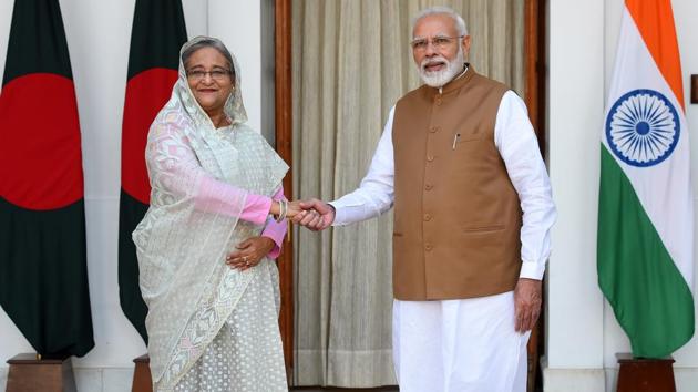 Prime Minister Narendra Modi greets Bangladesh Prime Minister Sheikh Hasina before their bilateral talk in New Delhi.(Mohd Zakir/HT file PHOTO)