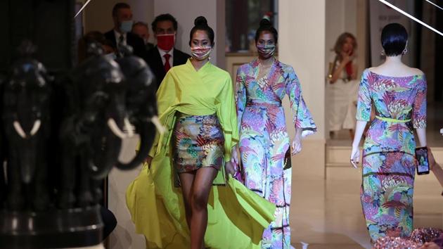 Models wear face masks as they present creations of the 2021 summer collection by designer Anja Gockel at Adlon Hotel, following the coronavirus disease (COVID-19) outbreak in Berlin, Germany, June 30, 2020. (REUTERS) Models wear face masks as they present creations of the 2021 summer collection by designer Anja Gockel at Adlon Hotel, following the coronavirus disease (COVID-19) outbreak in Berlin, Germany, June 30, 2020. (REUTERS)