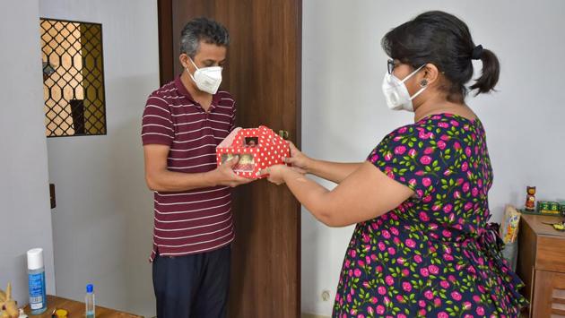 Shrutee Rane, a freelance illustration artist by profession, sells cupcakes baked by her, at Vasai in Palghar district on June 28. Rane makes a variety of cakes, breads and other confectionary items in her home kitchen and delivers them to her customers in a local circle. (Mitesh Bhuvad / PTI) Shrutee Rane, a freelance illustration artist by profession, sells cupcakes baked by her, at Vasai in Palghar district on June 28. Rane makes a variety of cakes, breads and other confectionary items in her home kitchen and delivers them to her customers in a local circle. (Mitesh Bhuvad / PTI)