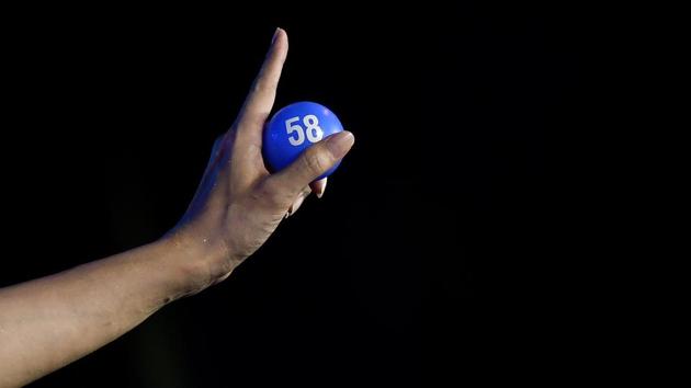 A transgender performer shows a number to participants during a lotto show in Ho Chi Minh City. “We perform with our sweat, tears and blood -- not just to sell fun but because I want people to understand this is a real profession,” La Kim Quyen, who has been performing with Sai Gon Tan Thoi and other lotto troupes since she was a teenager, told AFP. (Manan VATSYAYANA / AFP) A transgender performer shows a number to participants during a lotto show in Ho Chi Minh City. “We perform with our sweat, tears and blood -- not just to sell fun but because I want people to understand this is a real profession,” La Kim Quyen, who has been performing with Sai Gon Tan Thoi and other lotto troupes since she was a teenager, told AFP. (Manan VATSYAYANA / AFP)