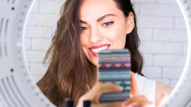 Get the right angle and lighting while doing a social media live (Shutterstock) Get the right angle and lighting while doing a social media live (Shutterstock)